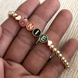 Customized 14k gold plated bracelet. Beads are alloy enamel beads & gold plated.